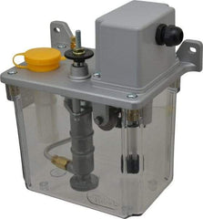 Trico - 2 L Reservoir Capacity, 3 - 6 cm Output per Cycle, 6-12 cm Output per Hour, Electric Central Lubrication System - 30 Min Interval Between Cycles, 130mm Wide x 225mm High, 110 Volts, Oil, 5/16-24 Outlet Thread - Caliber Tooling