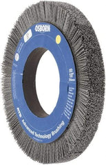 Osborn - 10" OD, 4-1/4" Arbor Hole, Crimped Nylon Wheel Brush - 1" Face Width, 1-1/4" Trim Length, 0.04" Filament Diam, 3,600 RPM - Caliber Tooling