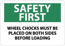 NMC - "Safety First - Wheel Chocks Must Be Placed on Both Sides Before Loading", 10" Long x 14" Wide, Pressure-Sensitive Vinyl Safety Sign - Rectangle, 0.004" Thick, Use for Accident Prevention - Caliber Tooling