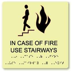 NMC - In Case of Fire - Use Stairway, Plastic Fire Sign - 8" Wide x 8" High, English/Braille, Glow-in-the-Dark - Caliber Tooling