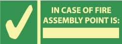 NMC - In Case of Fire - Assembly Point Is: _______, Pressure Sensitive Vinyl Exit Sign - 14" Wide x 5" High, Glow-in-the-Dark - Caliber Tooling