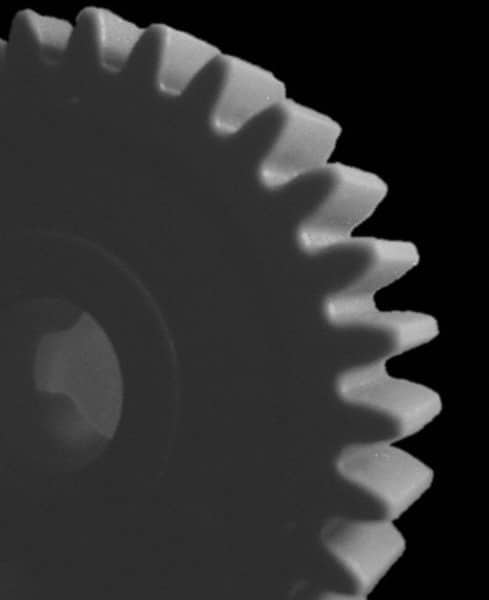 Made in USA - 24 Pitch, 1.167" Pitch Diam, 1-1/4" OD, 28 Tooth Spur Gear - 1/4" Face Width, 1/4" Bore Diam, 5/8" Hub Diam, 20° Pressure Angle, Acetal - Caliber Tooling