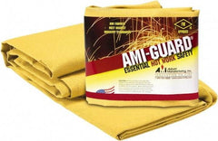 Auburn Mfr - 8' High x 6' Wide x 0.055" Thick Fiberglass Welding Curtain - Yellow, Grommet - Caliber Tooling