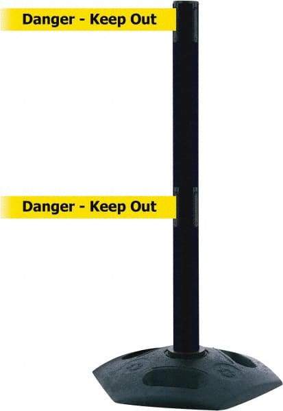 Tensator - 38" High, 2-1/2" Pole Diam, 4 Way Stanchion - 19" Base Diam, Octagon Recycled Rubber Base, Black Plastic Post, 7-1/2' x 2" Tape, Dual Line Tape, For Outdoor Use - Caliber Tooling