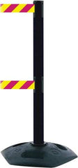 Tensator - 38" High, 2-1/2" Pole Diam, 4 Way Stanchion - 19" Base Diam, Octagon Recycled Rubber Base, Black Plastic Post, 7-1/2' x 2" Tape, Dual Line Tape, For Outdoor Use - Caliber Tooling