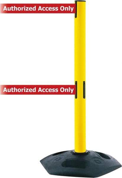 Tensator - 38" High, 2-1/2" Pole Diam, 4 Way Stanchion - 19" Base Diam, Octagon Recycled Rubber Base, Yellow Plastic Post, 7-1/2' x 2" Tape, Dual Line Tape, For Outdoor Use - Caliber Tooling