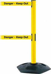 Tensator - 38" High, 2-1/2" Pole Diam, 4 Way Stanchion - 19" Base Diam, Octagon Recycled Rubber Base, Yellow Plastic Post, 7-1/2' x 2" Tape, Dual Line Tape, For Outdoor Use - Caliber Tooling