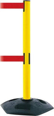 Tensator - 38" High, 2-1/2" Pole Diam, 4 Way Stanchion - 19" Base Diam, Octagon Recycled Rubber Base, Yellow Plastic Post, 7-1/2' x 2" Tape, Dual Line Tape, For Outdoor Use - Caliber Tooling