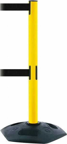 Tensator - 38" High, 2-1/2" Pole Diam, 4 Way Stanchion - 19" Base Diam, Octagon Recycled Rubber Base, Yellow Plastic Post, 7-1/2' x 2" Tape, Dual Line Tape, For Outdoor Use - Caliber Tooling