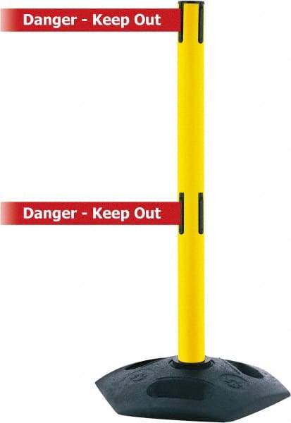 Tensator - 38" High, 2-1/2" Pole Diam, 4 Way Stanchion - 19" Base Diam, Octagon Recycled Rubber Base, Yellow Plastic Post, 13' x 2" Tape, Dual Line Tape, For Outdoor Use - Caliber Tooling