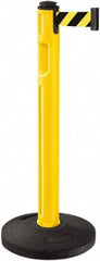 Lavi Industries - 38-1/4" High, 3-1/4" Pole Diam, Stanchion - 16" Base Diam, Dome Recycled Rubber Base, Yellow Plastic Post, 12' x 2" Tape, Single Line Tape, For Outdoor Use - Caliber Tooling