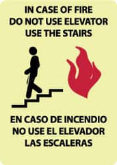 NMC - In Case of Fire - Do Not Use Elevator - Use the Stairs, Pressure Sensitive Vinyl Fire and Exit Sign - 10" Wide x 14" High, English/Spanish, Glow-in-the-Dark - Caliber Tooling