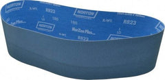 Norton - 4" Wide x 36" OAL, 180 Grit, Zirconia Alumina Abrasive Belt - Zirconia Alumina, Very Fine, Coated, X Weighted Cloth Backing, Series R823 - Caliber Tooling