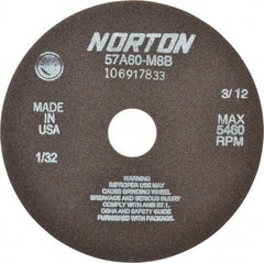 Norton - 7" 60 Grit Aluminum Oxide Cutoff Wheel - 1/32" Thick, 1-1/4" Arbor, 5,460 Max RPM, Use with Stationary Grinders - Caliber Tooling