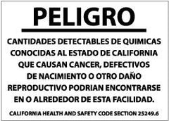 NMC - "Peligro - Cantidades Detectables de Quimicas Conocidas Al Estado de California Que Causan Cancer, Defectivos de Nacimiento...", 10" Long x 14" Wide, Pressure-Sensitive Vinyl Safety Sign - Rectangle, 0.004" Thick, Use for Hazardous Materials - Caliber Tooling