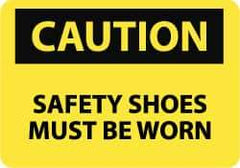 NMC - "Caution - Safety Shoes Must Be Worn", 10" Long x 14" Wide, Pressure-Sensitive Vinyl Safety Sign - Rectangle, 0.004" Thick, Use for Accident Prevention - Caliber Tooling